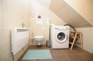 Koupelna v ubytování Pierta Apartment + 37 fotografií