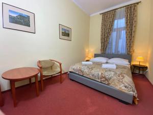Posteľ alebo postele v izbe v ubytovaní P&J Apartamenty Św. Krzyża