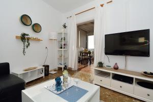 a living room with a large flat screen tv at Top Sea Views in El Golfo Prime location By PVL in El Golfo