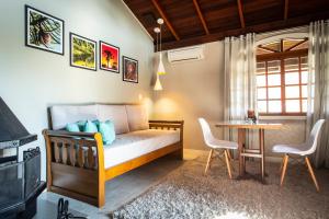 Llit o llits en una habitació de Hotel Bangalôs da Serra