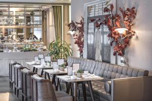 a row of tables and chairs in a restaurant at The Stay Nisantasi in Istanbul