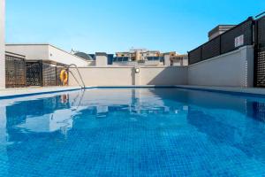 The swimming pool at or close to Teatro Cervantes SigloXXI