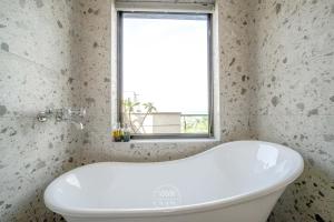 Et bad på 宜蘭-讀好民宿 Read Nice House B&B 電梯民宿
