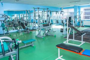 a gym with treadmills and machines at Tamsalu Spordikompleksi Hostel in Tamsalu