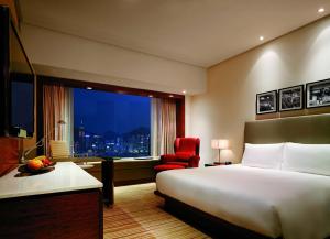 Postelja oz. postelje v sobi nastanitve Hyatt Regency Hong Kong Tsim Sha Tsui