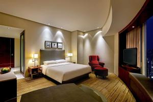 Postelja oz. postelje v sobi nastanitve Hyatt Regency Hong Kong Tsim Sha Tsui