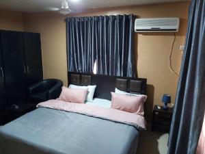 Katil atau katil-katil dalam bilik di StayCation Suites And Apartment
