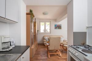 Kuchyň nebo kuchyňský kout v ubytování Beach Apartments "Bili Cvitak"