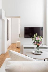 En tv och/eller ett underhållningssystem på Luxury Apartment 60