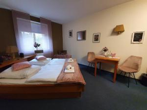 Krevet ili kreveti u jedinici u objektu Waldhotel Surwold