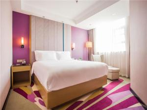 Voodi või voodid majutusasutuse Lavande Hotel Zhanjiang Guomao toas