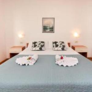 Кровать или кровати в номере Apartment Villa Lidija