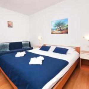 Кровать или кровати в номере Apartment Villa Lidija