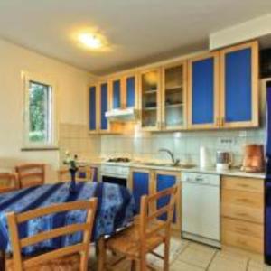 Kuchyň nebo kuchyňský kout v ubytování Holiday Home Sea view