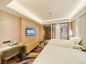 TV a/nebo společenská místnost v ubytování Lavande Hotels·Foshan West Railway Station Luocun