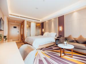 Postel nebo postele na pokoji v ubytování Lavande Hotel Suzhou High Speed Rail North Station