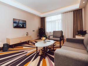 TV a/nebo společenská místnost v ubytování Lavande Hotel Suzhou High Speed Rail North Station