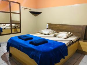 En eller flere senge i et værelse på Hotel Gasometro