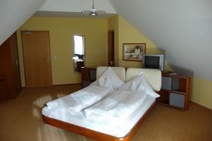Postel nebo postele na pokoji v ubytování Hotel Bachwiesen