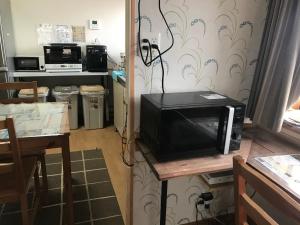 Kuchyň nebo kuchyňský kout v ubytování Nori's Sharehouse Hakuba