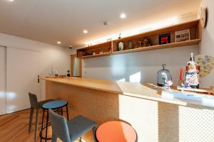 Eldhús eða eldhúskrókur á plat hostel keikyu haneda home