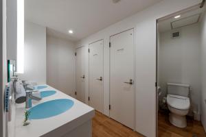 Baðherbergi á plat hostel keikyu haneda home