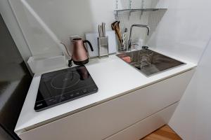 Eldhús eða eldhúskrókur á plat hostel keikyu haneda home