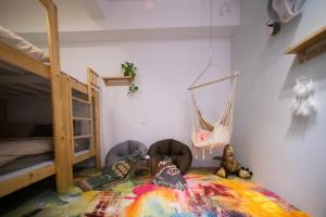 Cama ou camas em um quarto em QBE B&B