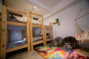 Cama ou camas em um quarto em QBE B&B