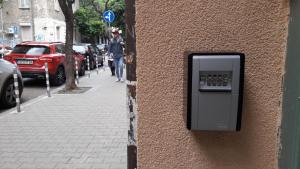 a pay phone on the side of a building at VIP Apartments Sofia in Sofia