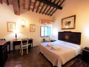Postel nebo postele na pokoji v ubytování Hotel Terme di Stigliano