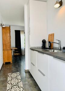 Virtuvė arba virtuvėlė apgyvendinimo įstaigoje Finca Bona Nit