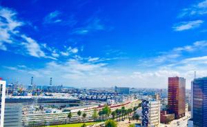 a view of a city with buildings and a blue sky at Petit nid douillé au coeur de Casablanca in Casablanca