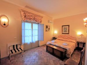Postel nebo postele na pokoji v ubytování Hotel Terme di Stigliano
