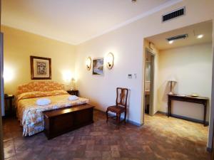 Postel nebo postele na pokoji v ubytování Hotel Terme di Stigliano