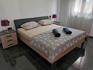Postel nebo postele na pokoji v ubytování Villa Prova M