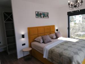 Postel nebo postele na pokoji v ubytování Villa Prova M