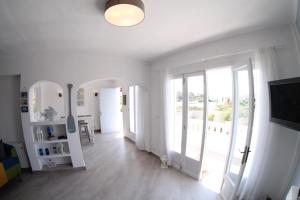 TV a/nebo společenská místnost v ubytování Casa del Mar