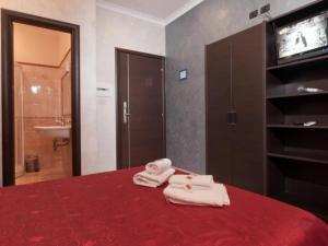Posteľ alebo postele v izbe v ubytovaní New Inn