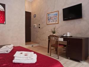 Posteľ alebo postele v izbe v ubytovaní New Inn