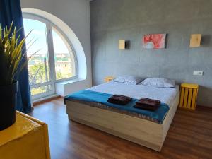 Voodi või voodid majutusasutuse Podobovo.if.ua toas