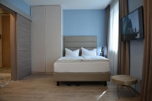 Postel nebo postele na pokoji v ubytování Belle Blue Zentrum