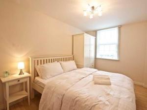 Postel nebo postele na pokoji v ubytování Dreamhouse Apartments Manchester City Centre