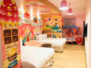 Postel nebo postele na pokoji v ubytování Legend Hotel Kaohsiung Pier2