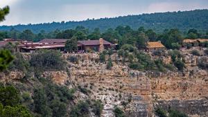 a building on the side of a mountain at Bright Angel Lodge - Inside the Park in Grand Canyon Village
