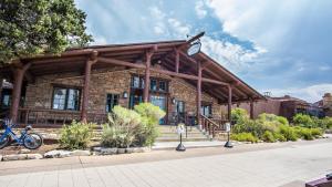 a building with a clock on top of it at Bright Angel Lodge - Inside the Park in Grand Canyon Village