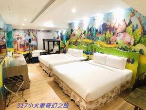 Postel nebo postele na pokoji v ubytování Legend Hotel Kaohsiung Pier2