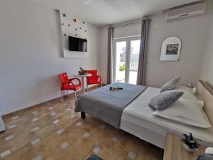 Postel nebo postele na pokoji v ubytování Villa Šimović