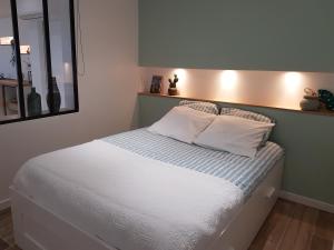 Postel nebo postele na pokoji v ubytování Gîte Las Colina