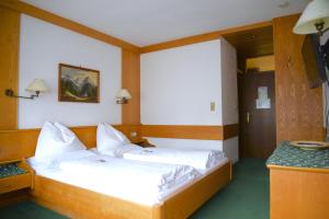 Postel nebo postele na pokoji v ubytování Haus Patricia
